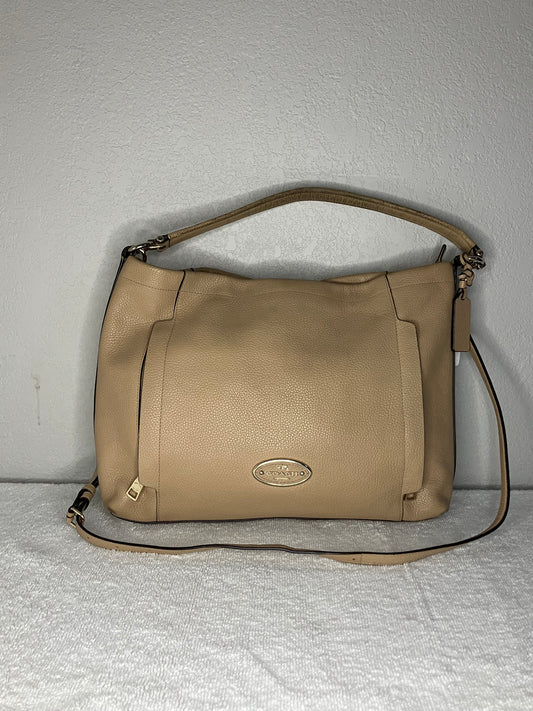 This is a Coach Scout Hobo shoulder Bag in Pebble Leather